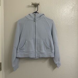 Lululemon cropped zip sweater in a light blue size xs/s